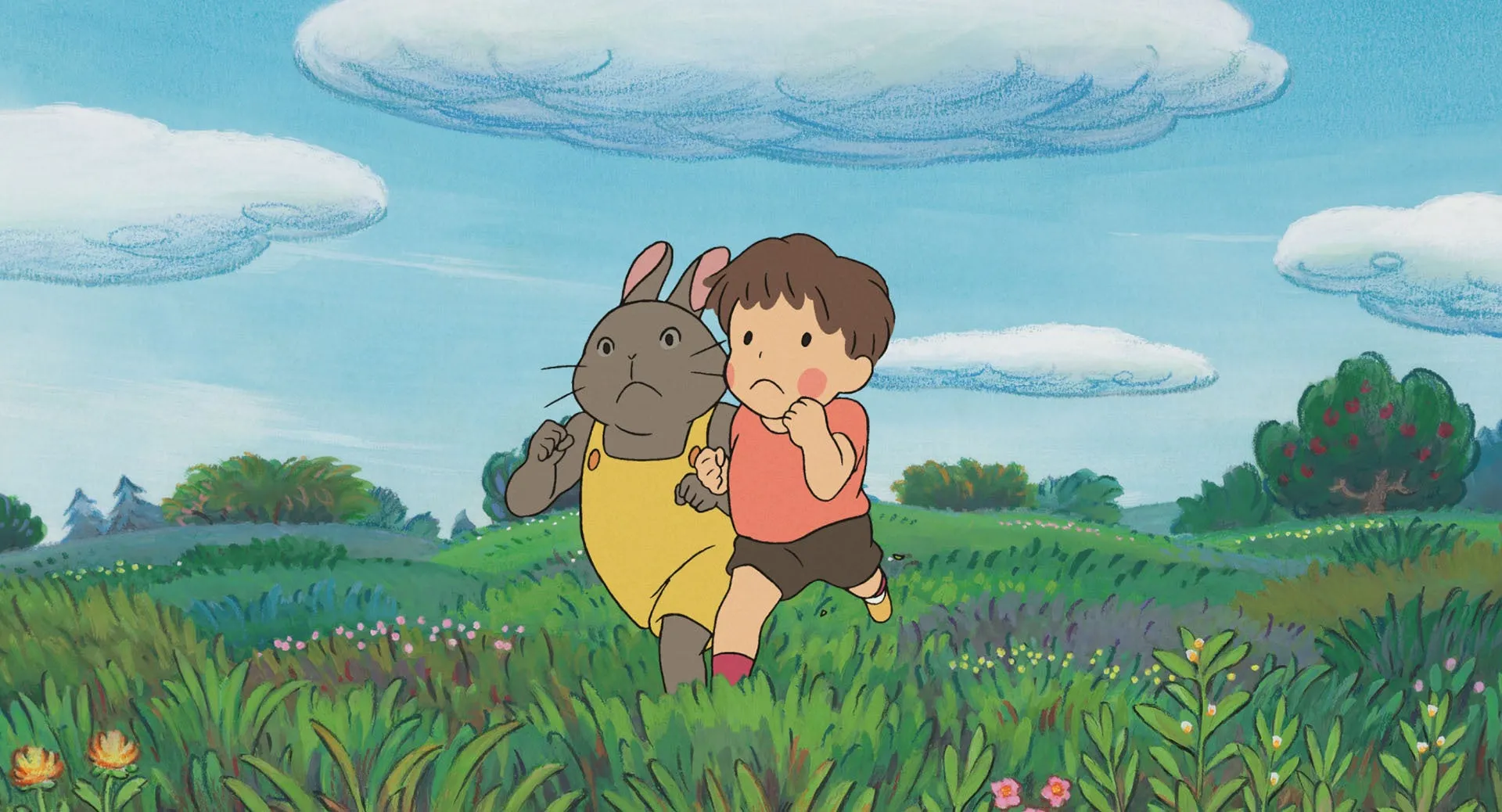 ジブリパークでキャラクターが草原を走るシーン