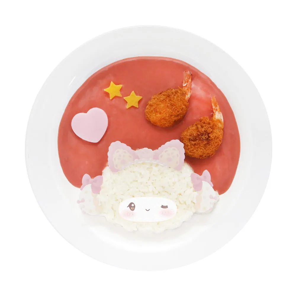 ピンク色のソースにキャラご飯とエビフライ