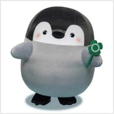 コウペンちゃんが四つ葉のクローバーを持っている