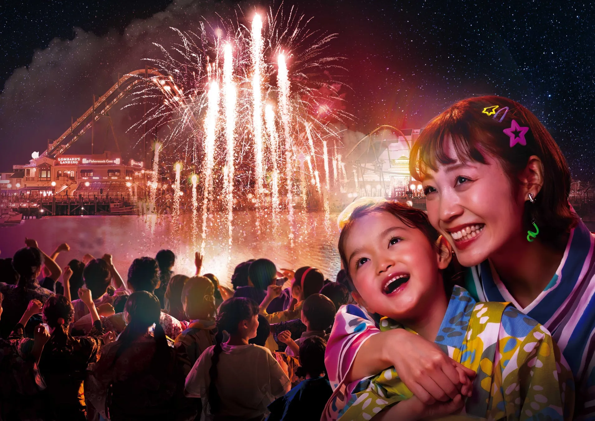 ユニバーサル・スタジオ・ジャパンの花火と笑顔の親子