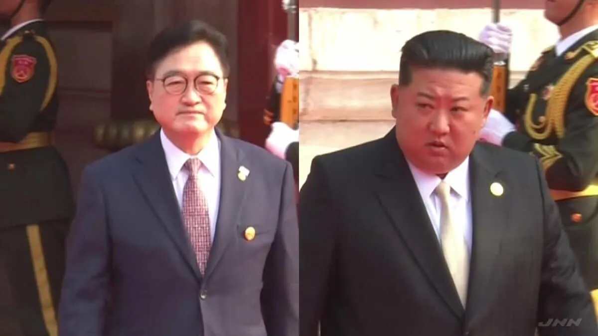 北朝鮮の金総書記と韓国の禹元植国会議長が握手 訪問中の中国で