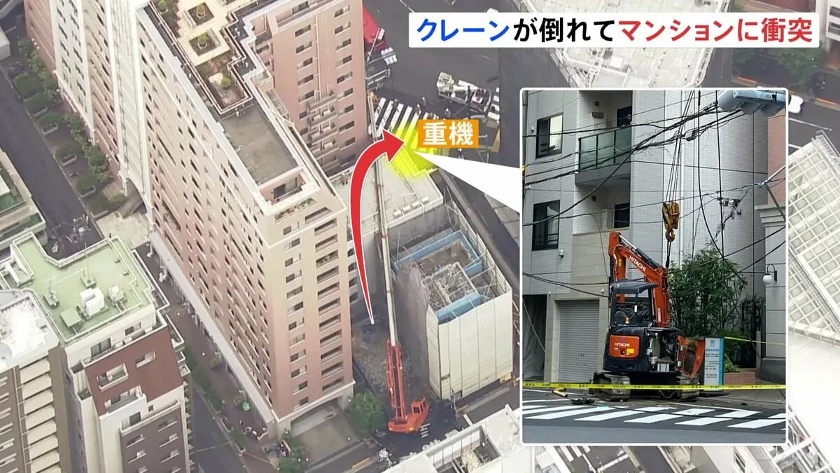「ビルが崩れたような大きい音が」解体現場でクレーン倒れマンションに衝突　つり上げていた別の重機は奥の路上に落下「大地震レベルの揺れ」