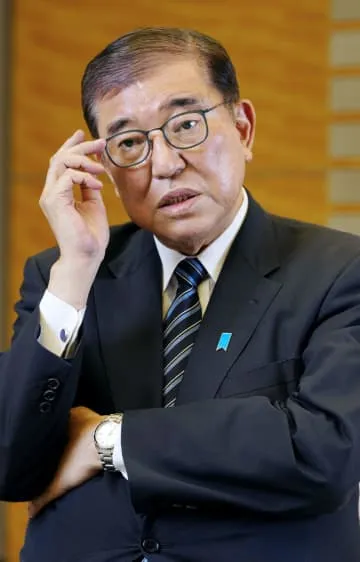 首相「変節当たらず」
