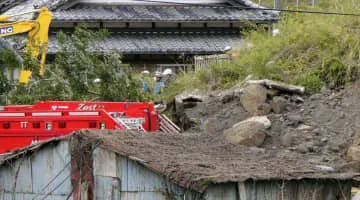土砂崩れの不明女性か
